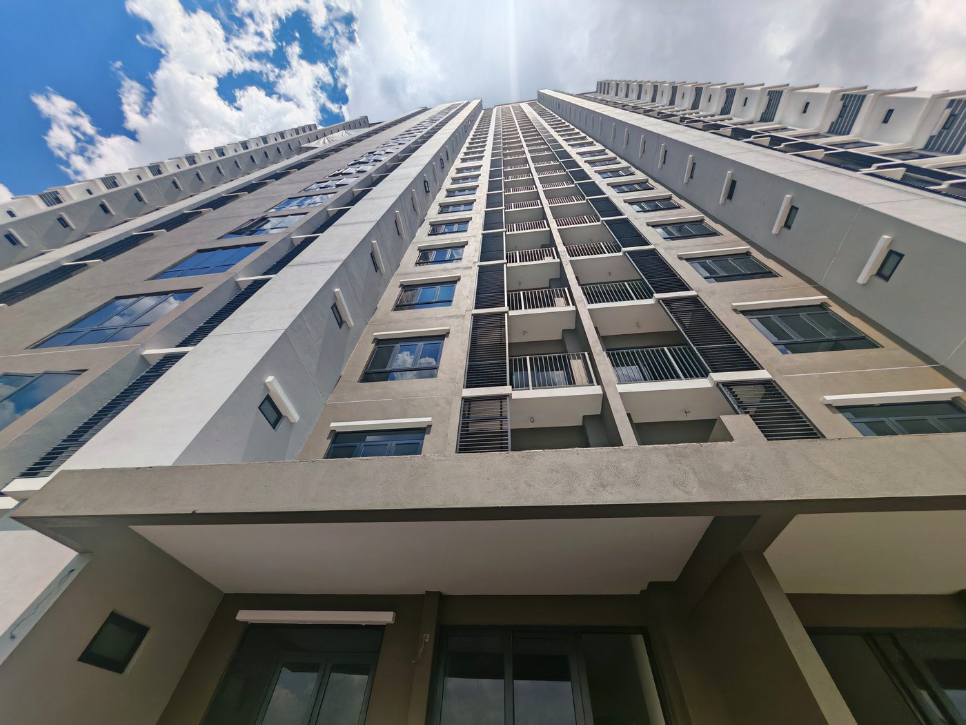 Dedaun Residensi facade completed, looking up